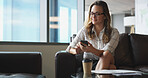 Phone, recruitment and waiting with business woman in office lobby for job opportunity or vacancy. App, resume and planning with candidate on sofa in workplace for hiring, interview or recruitment
