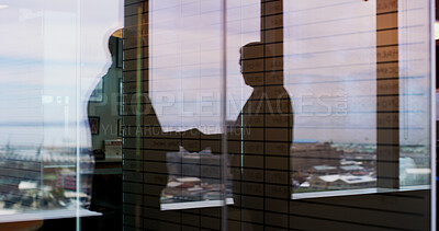 Buy stock photo Window, reflection and handshake with business people in office for regional plan, urban developer and b2b. Partnership, zoning code regulation and property acquisition with employees shaking hands