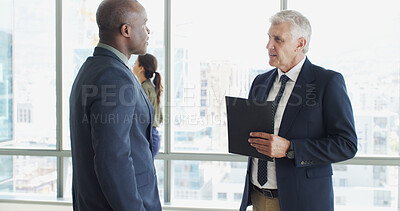 Buy stock photo Business men, documents and discussion in lobby, report and insight for project at insurance agency. Mature people, CEO and employee with paperwork, listening and perspective with advice at company