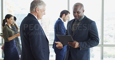 Buy stock photo Lobby, office and business men in meeting with report for feedback, finance review and planning. Discussion, corporate and workers with documents for strategy, financial advice and budget proposal