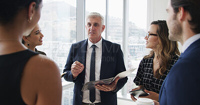 Buy stock photo Manager, documents and business people in meeting in office for feedback, financial review and planning. Corporate, delegating and boss with workers with report for strategy, project and proposal
