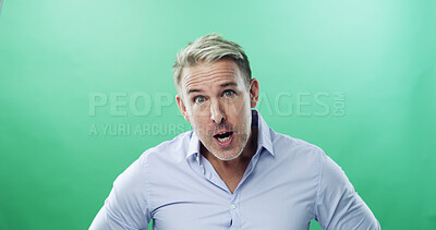 Buy stock photo Anger, portrait and businessman with speaking in studio with frustrated, stress and upset. Face expression, unhappy and mature professional with frown, annoyed and conflict on green background