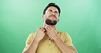 Itchy, neck and scratch with man on green background for allergic reaction or skin irritation. Dermatitis, eczema or inflammation and person in studio with rash or symptoms of medical condition