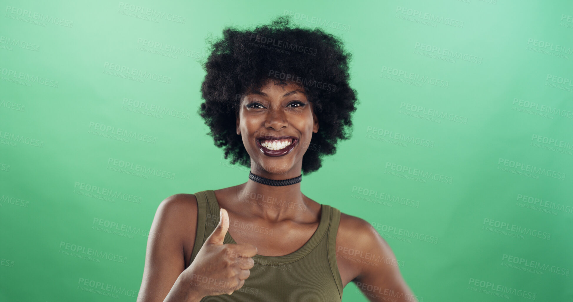 Buy stock photo Portrait, smile and thumbs up with black woman in studio for approval or review of creative career. Emoji, motivation and success with African stylist on green background for like, reaction or yes