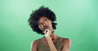 Buy stock photo Thinking, planning and black woman in studio with ideas, decision or brainstorming for university. Problem solving, mockup space and African female student with choice for college by green background