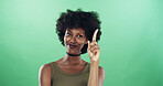 Black woman, thinking or idea with afro on green background for problem solving in studio. Female person, thinker and African model with good decision for solution, question or answer on mockup space