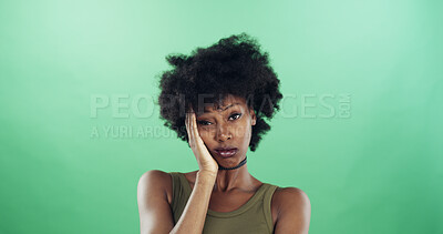 Buy stock photo Bored, portrait and black woman in studio with annoyed, fatigue or thinking facial expression. Mockup space, upset and African female person with exhaustion, tired or moody face by green background.