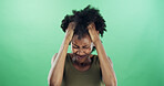Frustration, annoyed and black woman in studio with reaction for mistake, fail or crisis problem. Stress, emotions and African person with regret for rage, fear or mental health by green background.