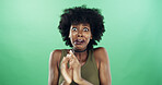 Black woman, portrait and scared with fear on green background for horror or fright in studio. Female person, anxiety or African model with shock, panic scare for terror or danger on mockup space
