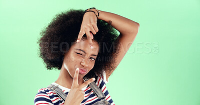 Buy stock photo Portrait, black woman and happy with peace sign in studio with pouting, afro and cool attitude. Wink, female person and hand gesture on green background with mockup space, positive and casual style
