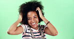 Portrait, black woman and happy with afro in studio with hair care, hairstyle and growth with a smile. Excited, female person and natural on green background with space, positive and casual style