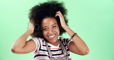 Buy stock photo Portrait, black woman and happy with afro in studio with hair care, hairstyle and growth with a smile. Excited, female person and natural on green background with space, positive and casual style