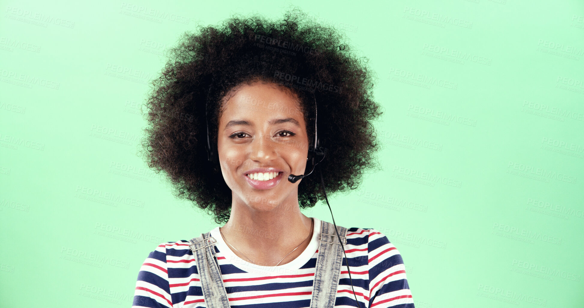 Buy stock photo Black woman, portrait and call center mic with headset for communication, customer support or help desk. Contact us, CRM or consultant in studio with space, smile and advice on green background