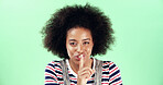 Black woman, portrait and finger with hush, green screen and silence for mystery announcement. Model, gossip and secret with rumor, whisper and gesture for news with privacy on chromakey background