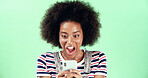 Green background, woman and excited with shock for smartphone, breaking news and online discount. Mockup, African female person and surprised with mobile app for reading, offer notification or studio