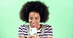 Green background, woman and winner with shock for smartphone, breaking news and online discount. Mockup, African female person and surprised with mobile for offer notification, excited and studio