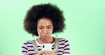 Buy stock photo Green background, mobile app or black woman with shock for breaking news, mockup and online scam. Space, stress and surprised African girl with phone for reading error, notification alert or studio