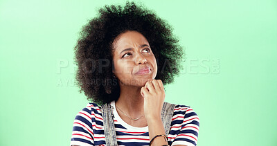 Buy stock photo Black woman, thinking and green screen for choice, option and education comparison. Student person, question and idea on chroma key for opportunity, problem solving and decision with doubt in studio