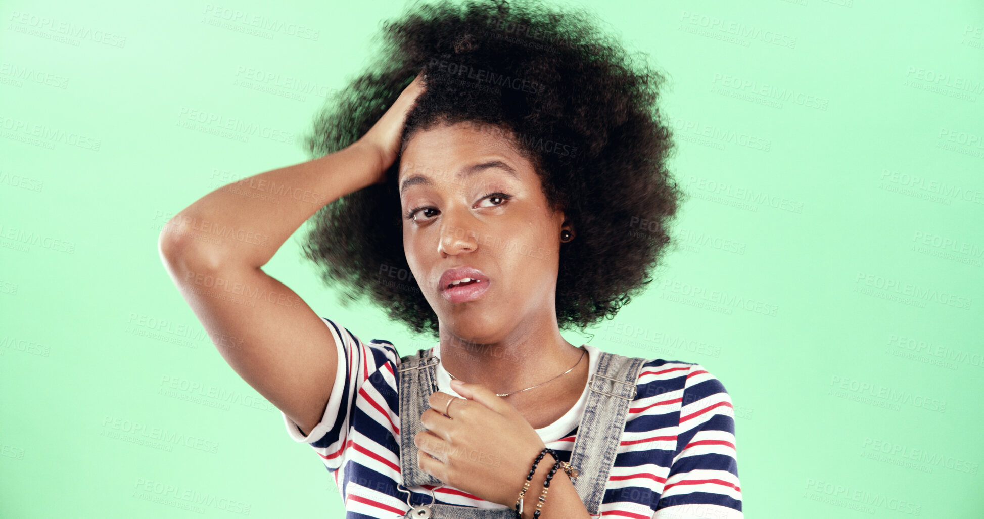 Buy stock photo Confused, remember and thinking with black woman on green background for hangover recovery. Afro, doubt and tired with drunk person in studio for memories of party or symptoms of drinking alcohol