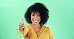 Green background, woman and portrait with smile for thumbs up, agreement and yes sign with mockup. African female person, happiness and emoji reaction with hand gesture for opinion, review and studio