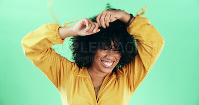 Buy stock photo Dance, energy and smile with black woman on green screen for celebration, excitement or party. Movement, music and rhythm with happy African person in studio for expression, freedom or passion