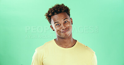 Buy stock photo Comic, funny face and smile with black man on green background in studio for humor, joke and meme. Portrait, crazy and comedy with happy African student, model and playful with expression and joy