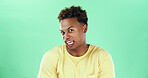 Portrait, disgusted and man with reaction, studio and facial expression for disapproval and dislike. Green background, cringe and black person with shock for bad smell, mockup space and grimace