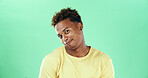Goofy, funny face and silly black man on green background for humor, joke and meme in studio. Portrait, excited and comedy with happy African student, model and playful with expression and joy