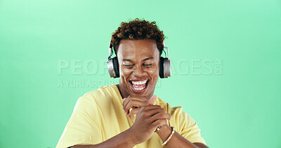 Buy stock photo Black man, headphones or happy dance on green background with music and smile. Mockup space, song audio and excited model in studio for celebration with rhythm, positive energy and streaming sound