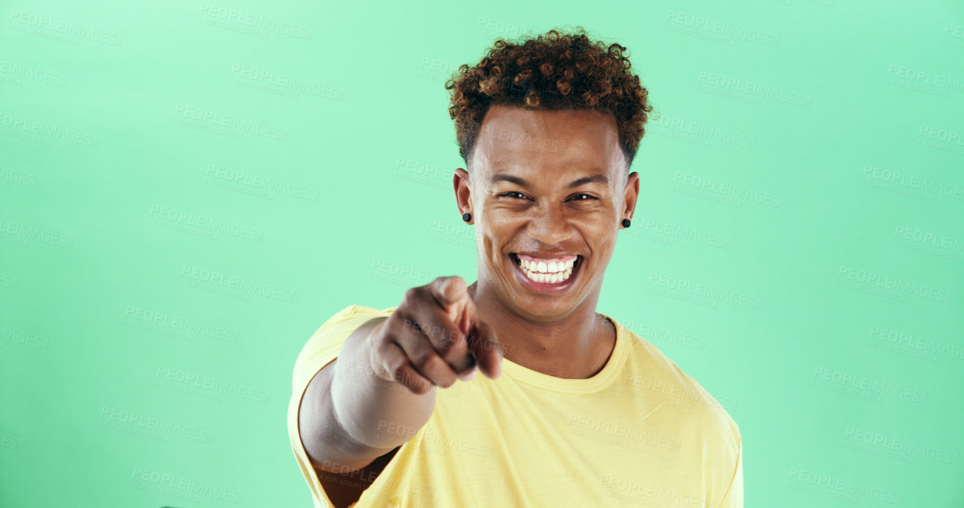 Buy stock photo Happy, portrait or black man pointing to you on green background for choice in studio. Male person, model or smile with selection, choose or gesture for pick, decision or opportunity on mockup space