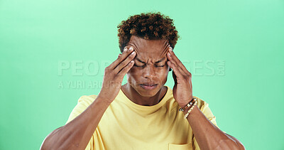 Buy stock photo Frustrated man, headache and stress with green background for injury or anxiety in studio. Male person, model or pain with migraine or strain for mental health, depression or fatigue on mockup space