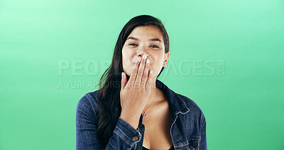 Buy stock photo Portrait, woman and kiss hand in studio for flirting, show attraction and romantic gesture. Mockup space, female person and smile for love emoji on valentines day, affection sign and green background