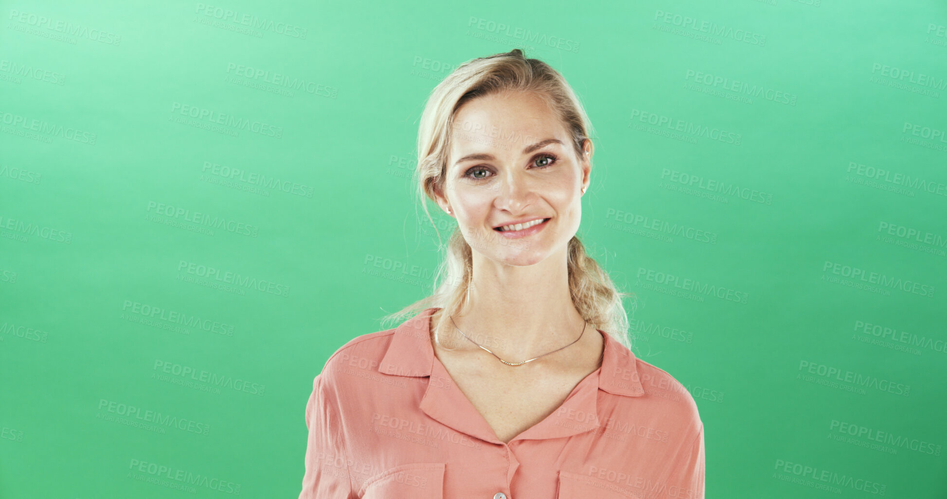 Buy stock photo Happy, woman and portrait of teacher in studio with confidence for education career with ambition. Smile, mockup space and educator from London with pride for creche school job by green background.