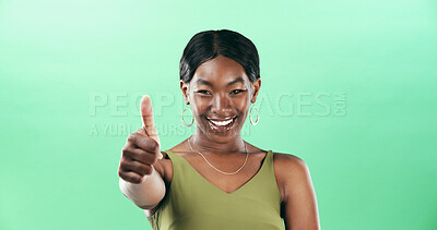 Buy stock photo Black woman, thumbs up and portrait with happiness for support in studio, vote or review with gesture on green background. Hand, yes sign or signal with emoji, female person and feedback by space