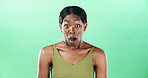 Bad news, black woman and portrait with shock in studio for announcement, gossip and drama. Mockup space, african person and surprised by fear with reaction, overwhelmed or scared on green background