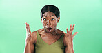 Portrait, reaction and woman with shock, studio or facial expression for announcement of win or wow. Green background, surprised and black person with open mouth for news, mockup space and amazed