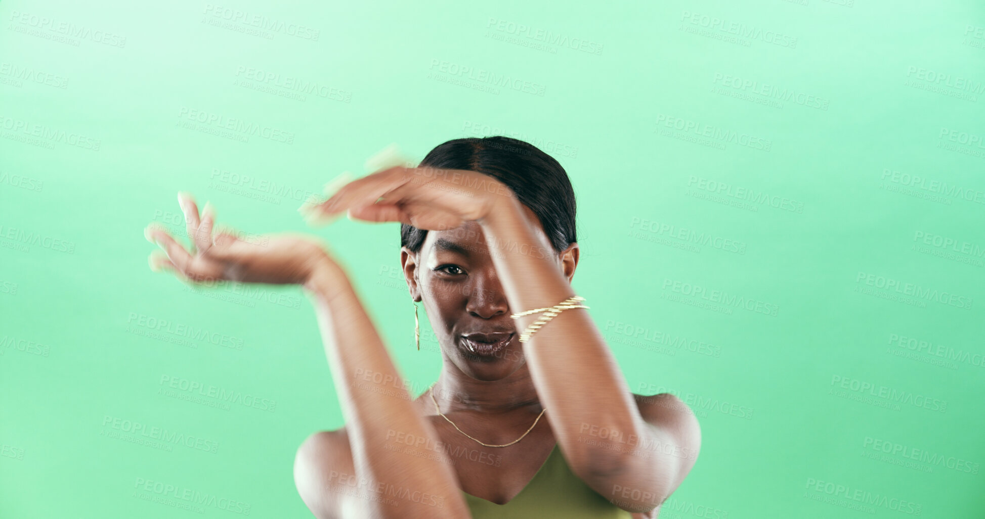 Buy stock photo Dancer, energy and hands with woman in studio for movement, freedom and celebration. Performance, sound and dancing with female person on green background space for entertainment, music and rhythm