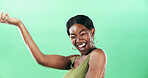 Dancer, energy and excited with black woman in studio for movement, freedom and celebration. Performance, sound and dancing with person on green background space for entertainment, music and rhythm