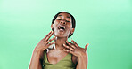 Music, singing and voice of black woman on green background for performance or talent show. Artist, concert and event with African singer in studio for broadway, entertainment or karaoke audition