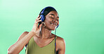 Smile, dancer and headphones with black woman in studio for streaming, audio playlist and music. Performance, sound and dancing with female person on green background for entertainment and space