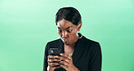 Black woman, smartphone and business announcement for shock in studio, feedback and alarm for web error. Green background, wow or professional communication alert with mobile app, fake news or glitch