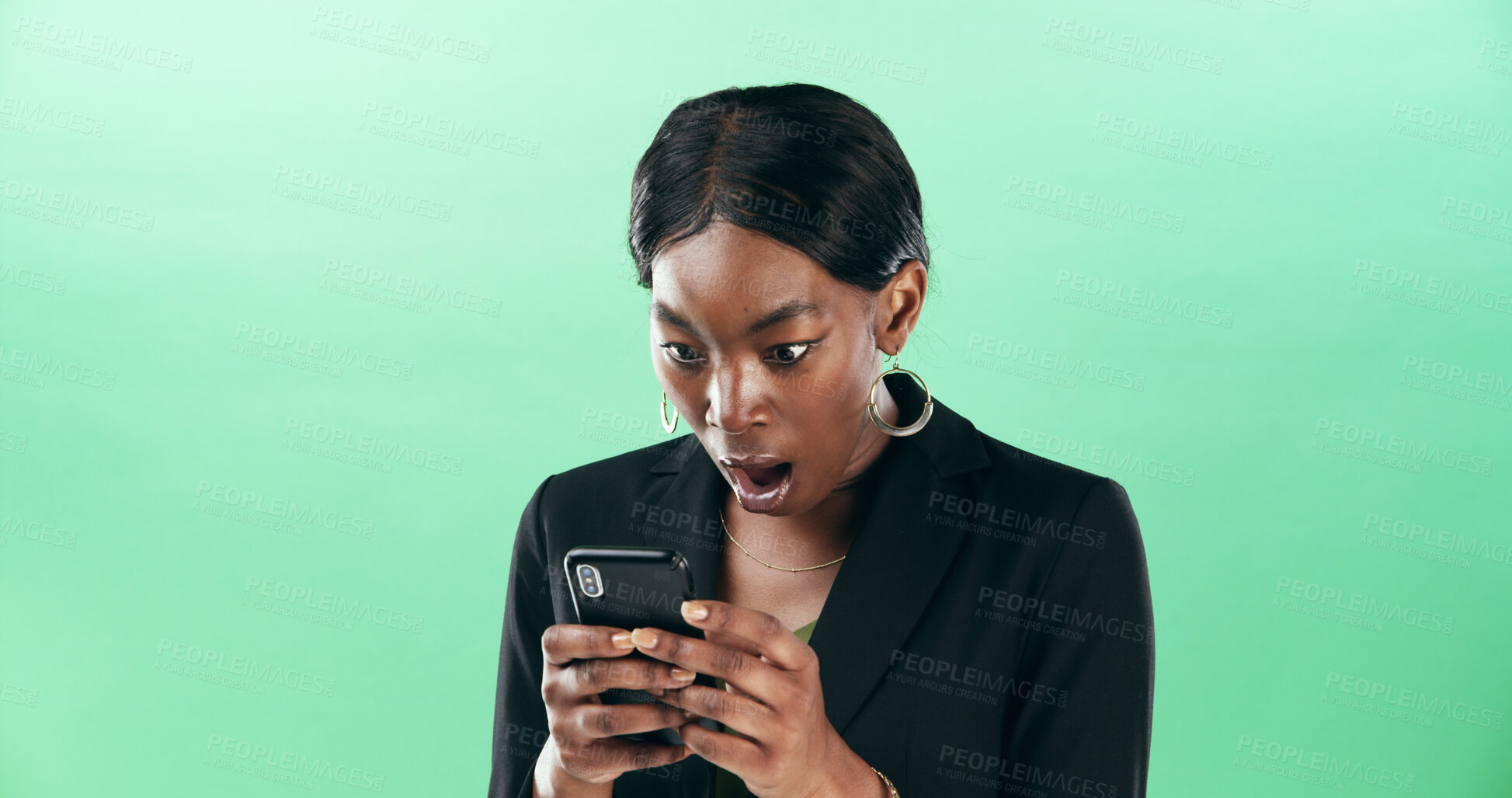 Buy stock photo Black woman, phone and business announcement for shock in studio, feedback and alarm with open mouth . Green background, wow or professional communication alert with mobile app, fake news or space