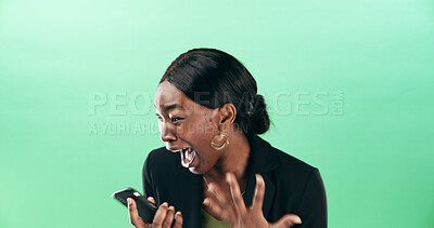 Buy stock photo Excited, black woman and screaming with phone for good news or winning on a green studio background. Female person, employee or winner shouting with surprise on mobile smartphone for bonus promotion
