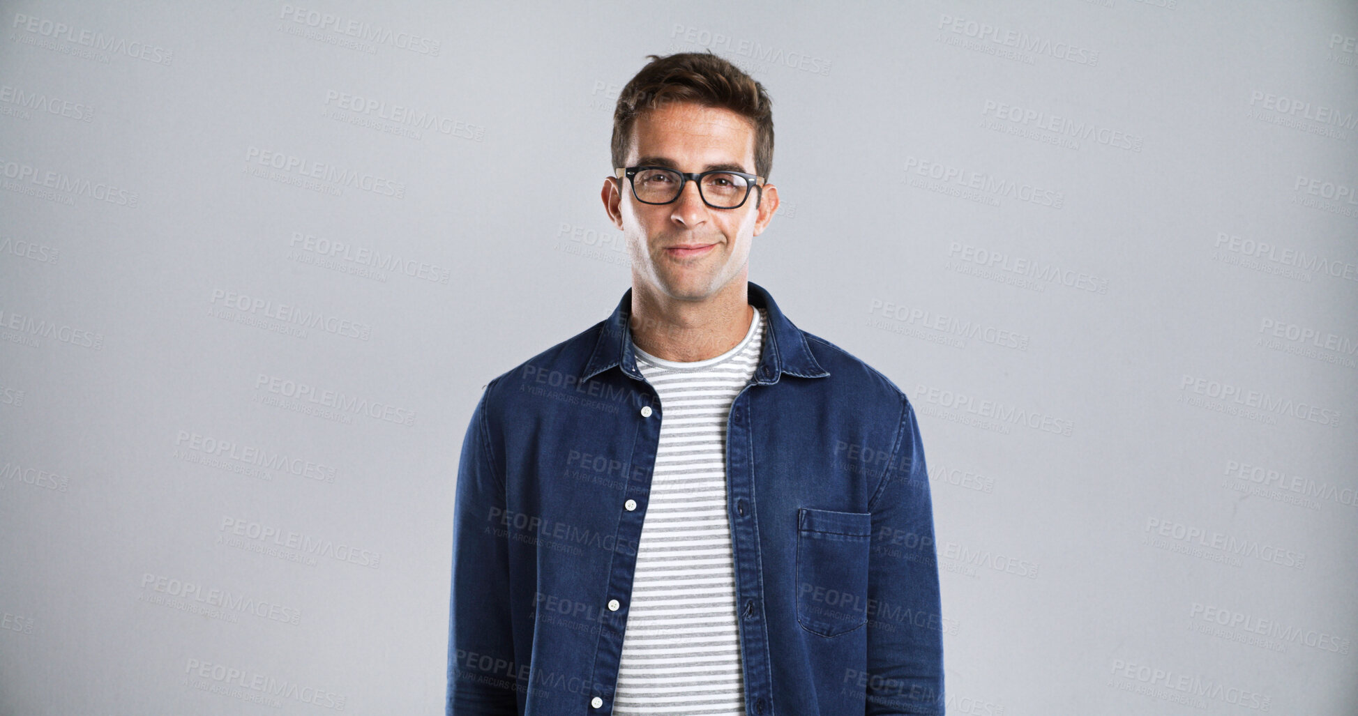Buy stock photo Man, portrait and glasses for fashion or vision, trendy eyewear and stylish in studio. Designer frame, spectacles and male person with denim style, space and prescription lens on white background
