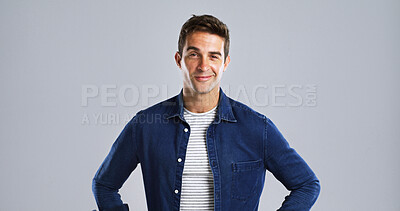 Buy stock photo Man, confidence and denim shirt for fashion with casual tshirt, trendy style and portrait on white background. Jean apparel, stripes and male model with stylish outfit, mockup space and cool clothes