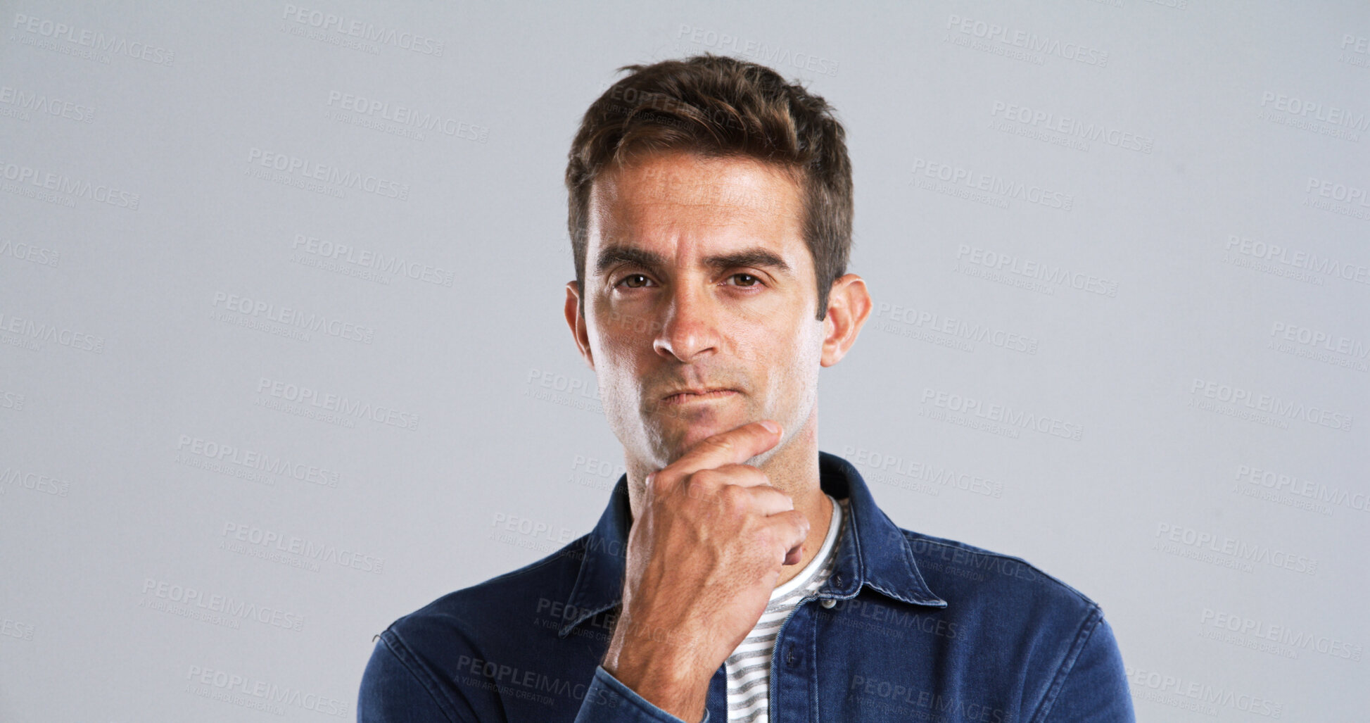Buy stock photo Thinking, man and doubt with portrait in studio for fake news, problem solving or brainstorming. Mockup space, puzzled and person contemplating with question, solution or wondering on gray background