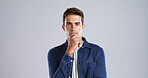 Portrait, man and thinking with anger in studio for planning, ideas and doubt for fake news. Mockup space, male person and uncertain of problem solving, question decision and upset on gray background
