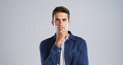 Buy stock photo Portrait, man and thinking with anger in studio for planning, ideas and doubt of fake news. Mockup space, male person and uncertain of problem solving, question decision and upset on white background
