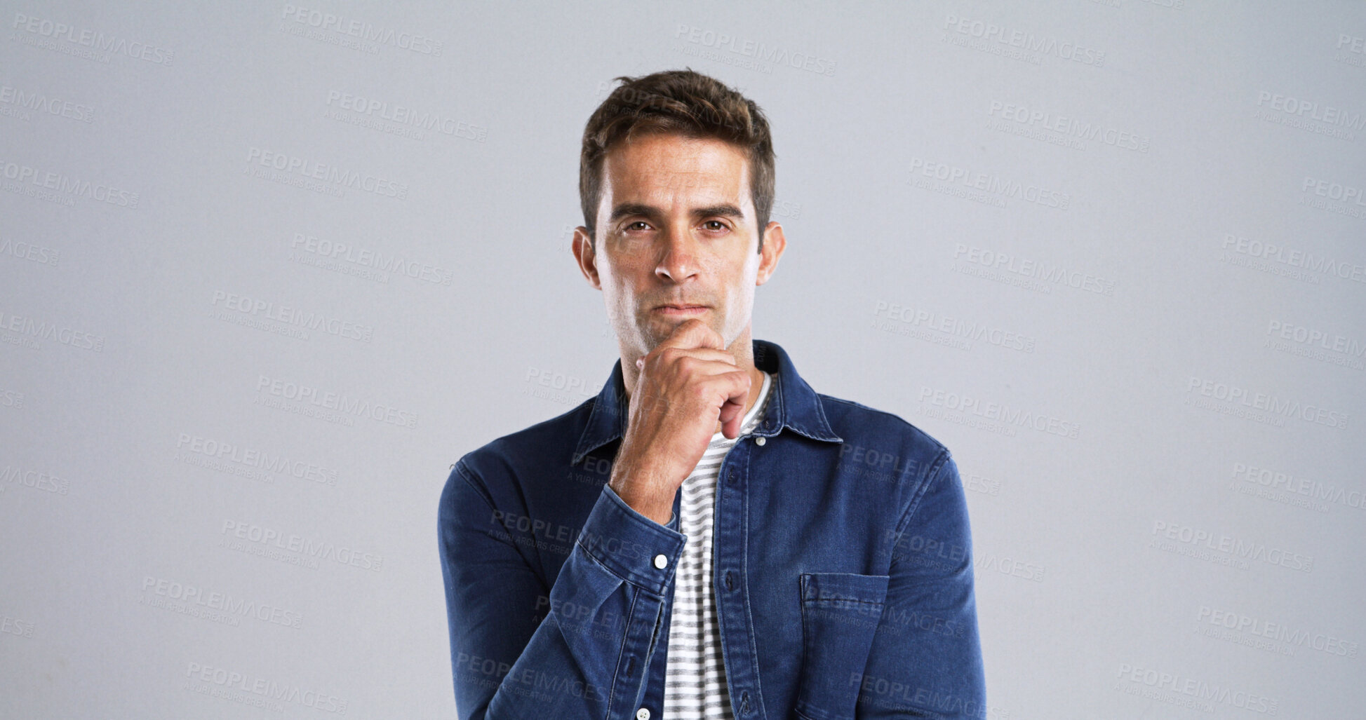 Buy stock photo Portrait, man and thinking with anger in studio for planning, ideas and doubt of fake news. Mockup space, male person and uncertain of problem solving, question decision and upset on white background
