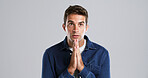 Man, prayer and hope in studio for faith, praise and connection with Jesus Christ by background. Person, hands and reflection for religion, mindset and spiritual worship for God with mock up space